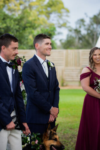 groom reacts to seeing his bride at Sandstone Point Hotel Wedding